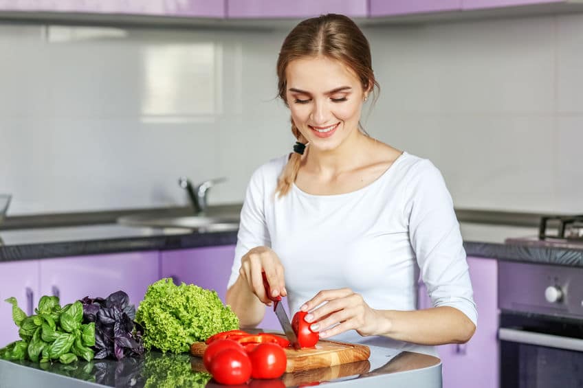 Woman prepping food for a meal